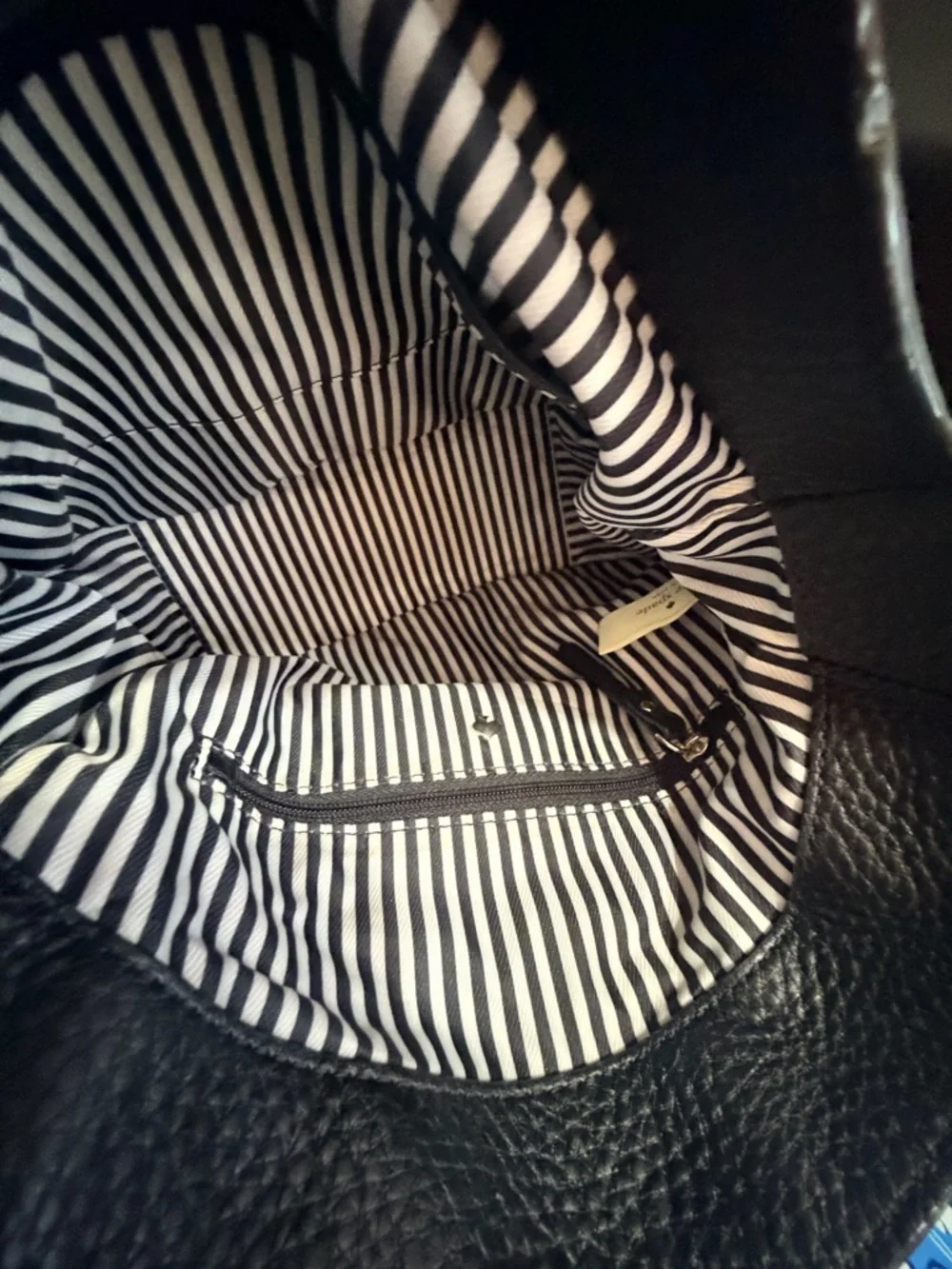 Kate Spade Black Saddle Bag Like New Condition. Very stylish and comfortable.